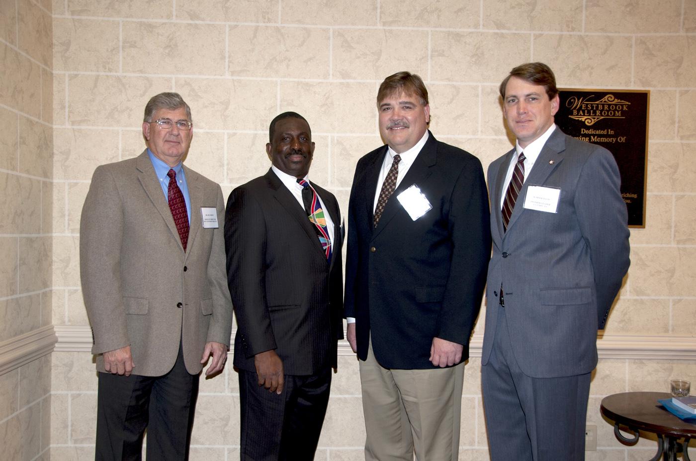 Newly elected Mississippi supervisors attended a training session held by Mississippi State University Extension Service's Center for Governmental Training and Technology in December. Leaders at the meeting included from left: Joe Street, associate director of MSU's Extension Service; Charles Selmon, president of the Mississippi Supervisors' Association; Gary Jackson, director of MSU's Extension Service; and Sumner Davis, interim leader for the Center for Governmental Training and Technology. (Photo by Kat 