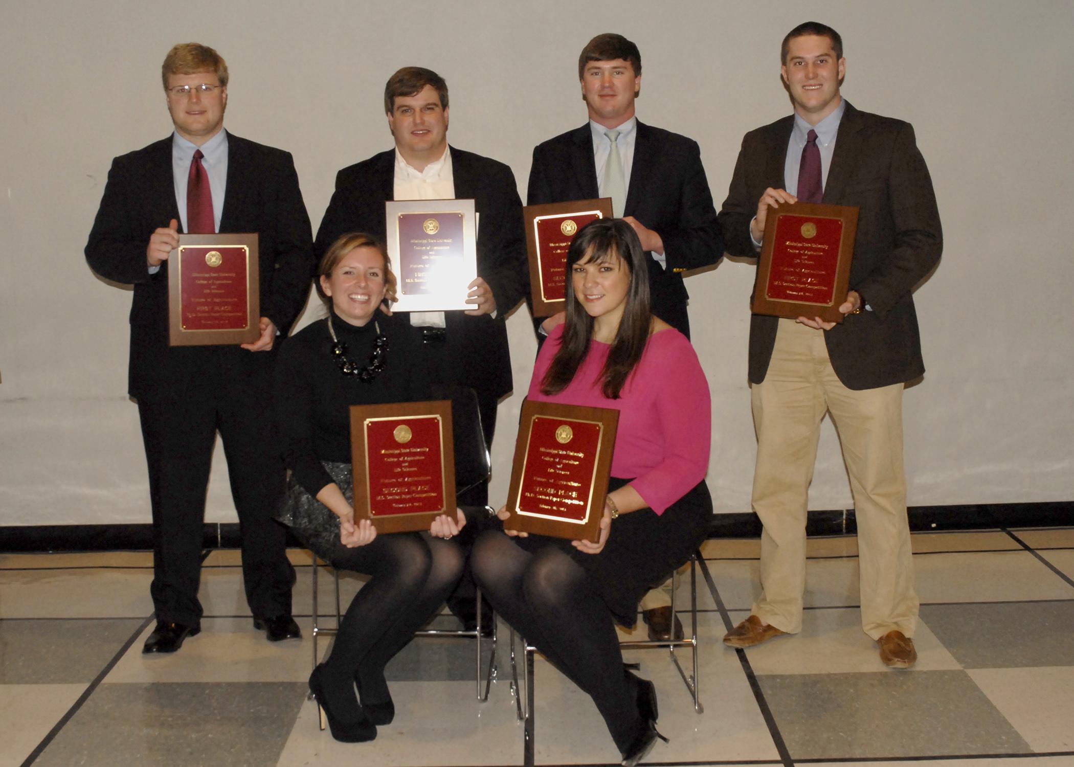 Mississippi State University graduate students gave presentations on their agricultural research during Feb. 7 competition on campus. Those placing in the doctoral level or one of two master's level competitions included, front row, from left, Aly Shinkle, second place in master's competition; and Amber Eytcheson, second place in the Ph.D. section; and back row, from left, Ben Von Kanel, first place in the Ph.D. section; Andrew Adams, first place in a master's section; Garret Montgomery, second place in a m