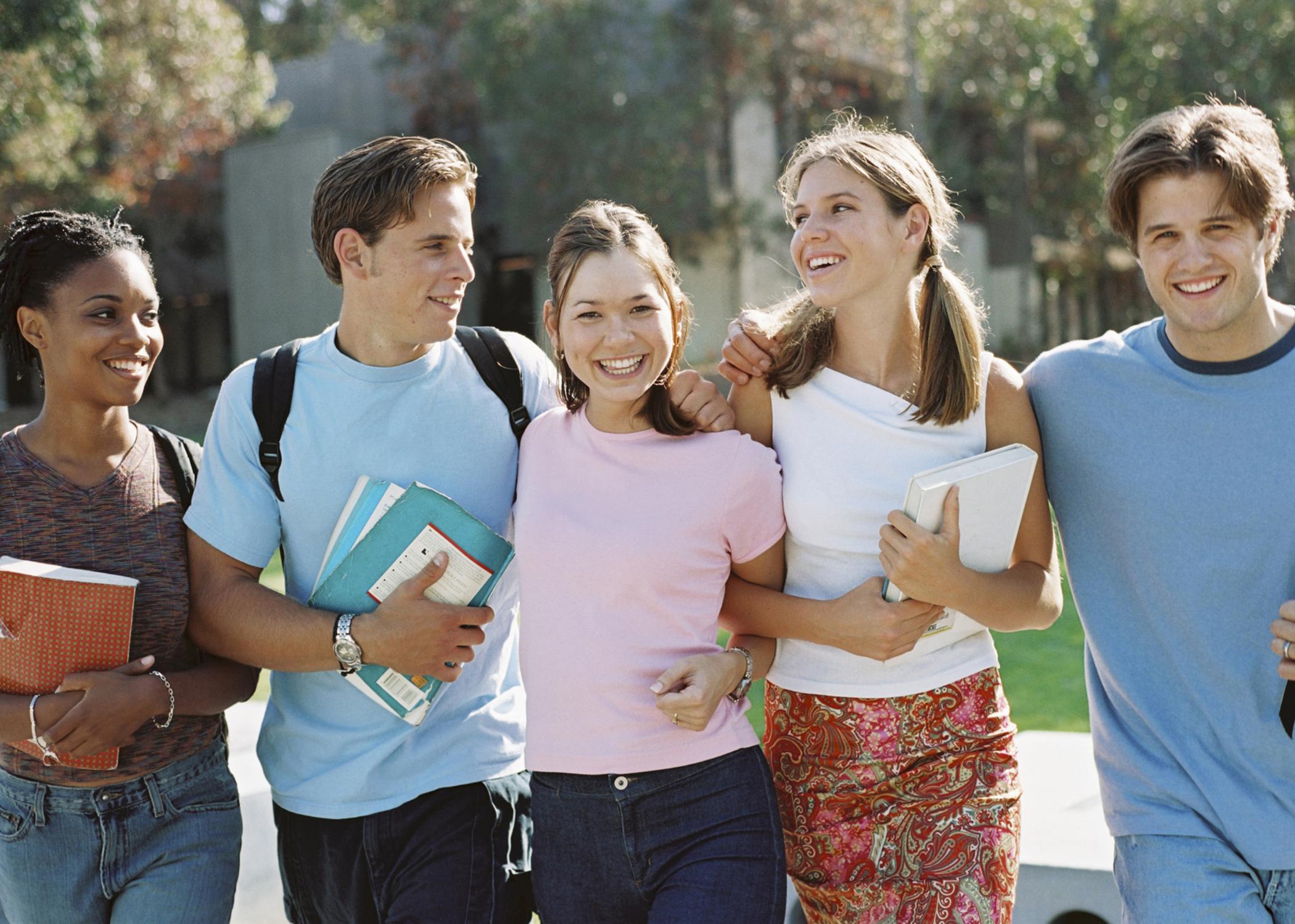 Older students should walk or bike to school in groups, while younger children should always be accompanied by an adult. (Photo by Bananastock)