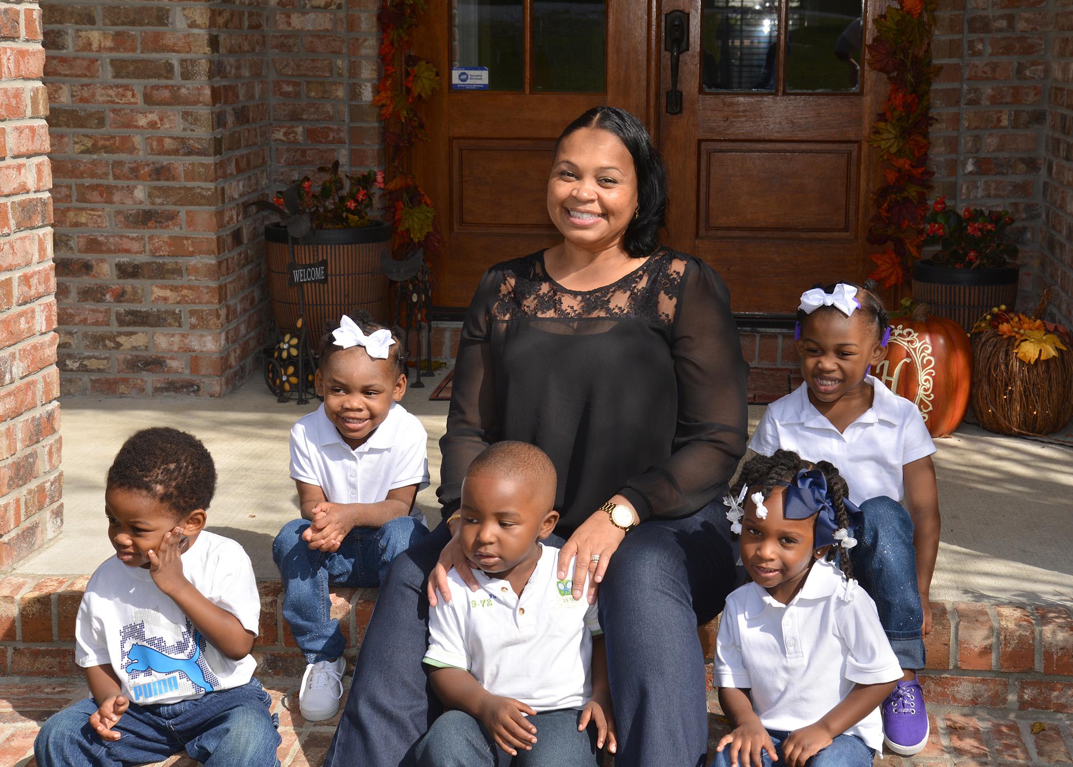 Regina Hinton (center), owner of Little Pebbles Child Care, celebrates her success with her students. Clockwise from top left are Holli Young, Gabriel Hugger, Hayden Young, Raelynn Harris and Haleigh Young. (Photo by MSU School of Human Sciences/Amy Barefield)