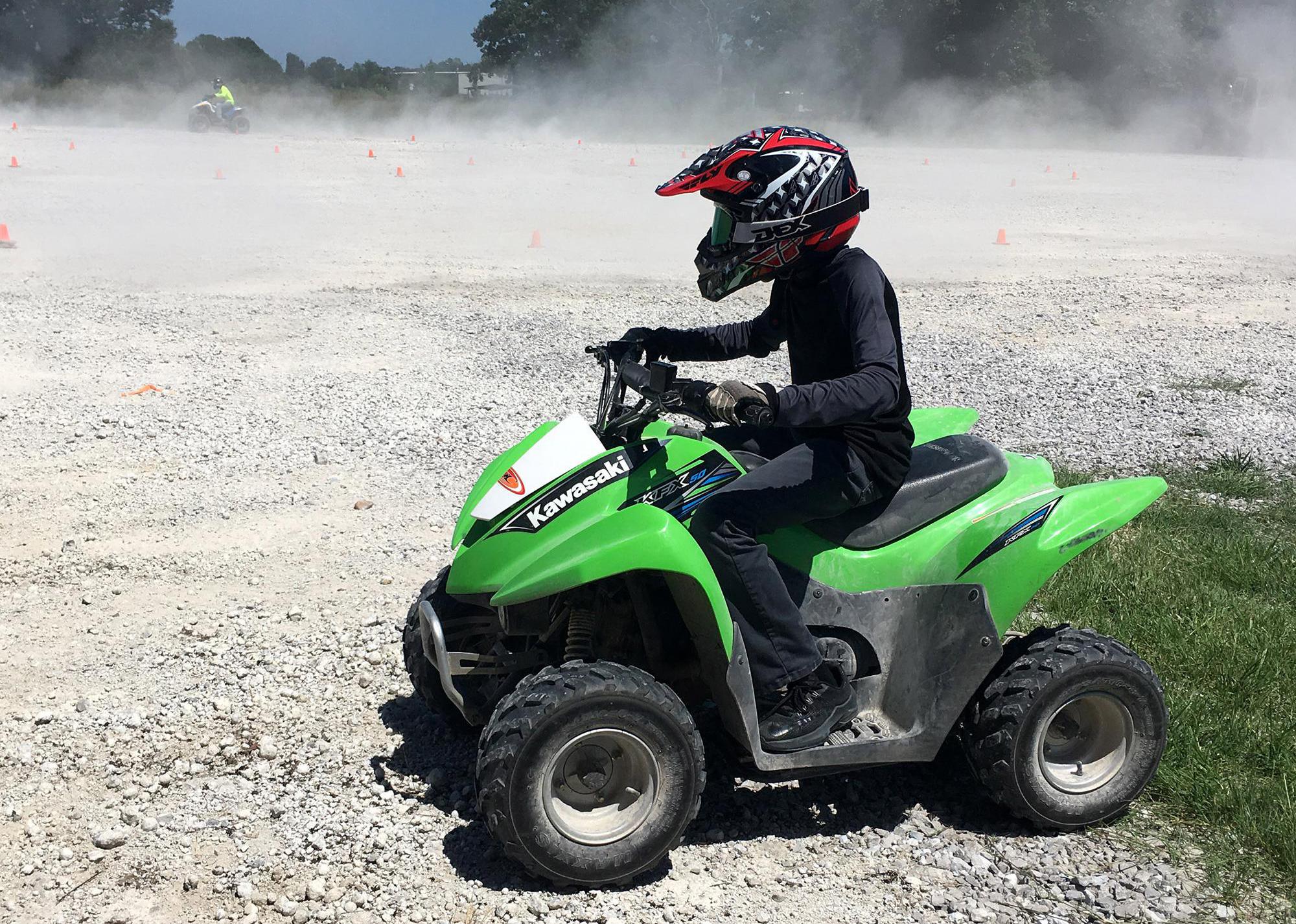 Person on a green ATV