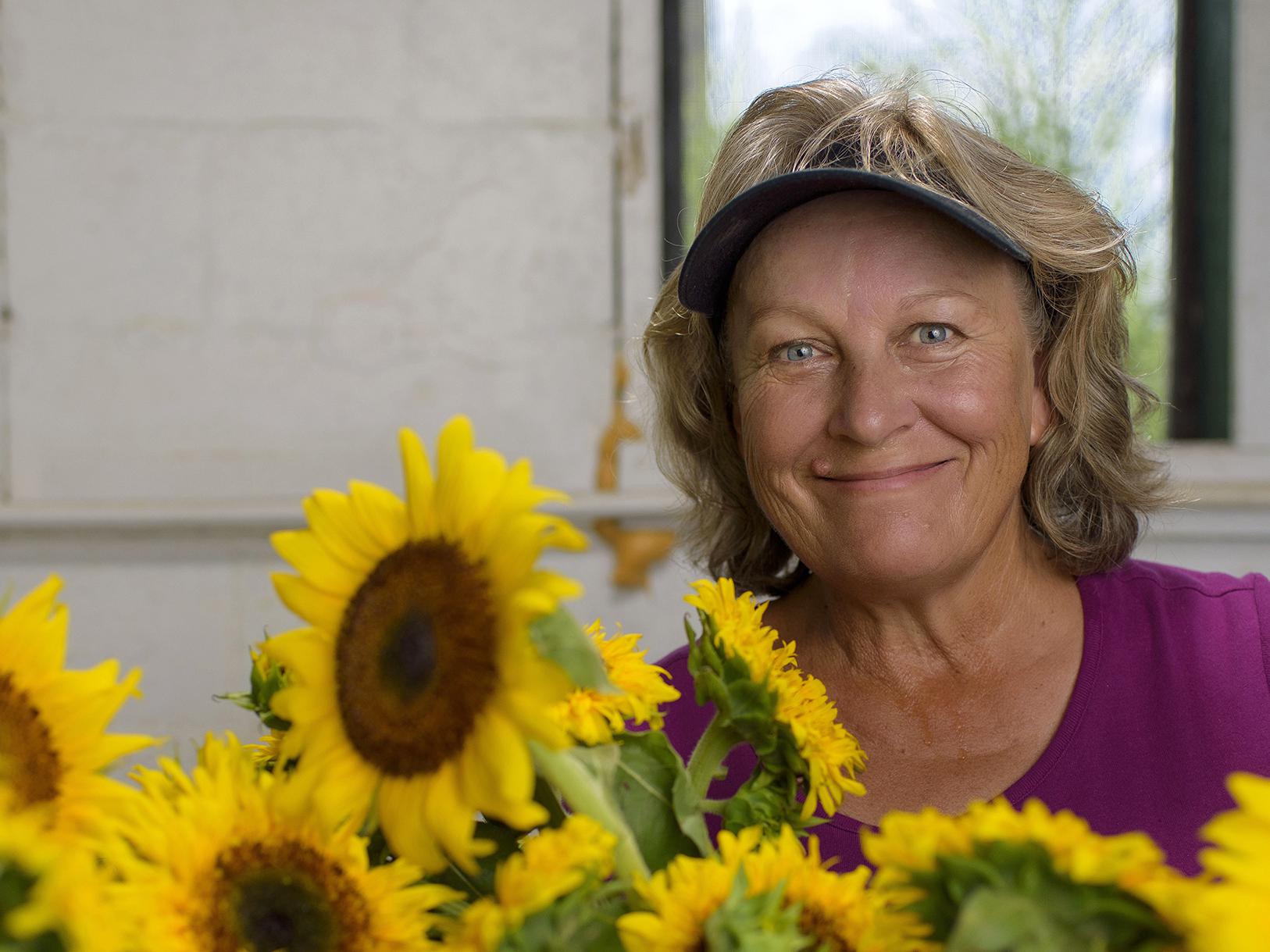 Terri Doyle grows sunflowers at Coastal Ridge Farm on the Mississippi Gulf Coast and sells them to wholesale distributors and at farmers markets. (Photo by MSU Extension Service/Kevin Hudson)