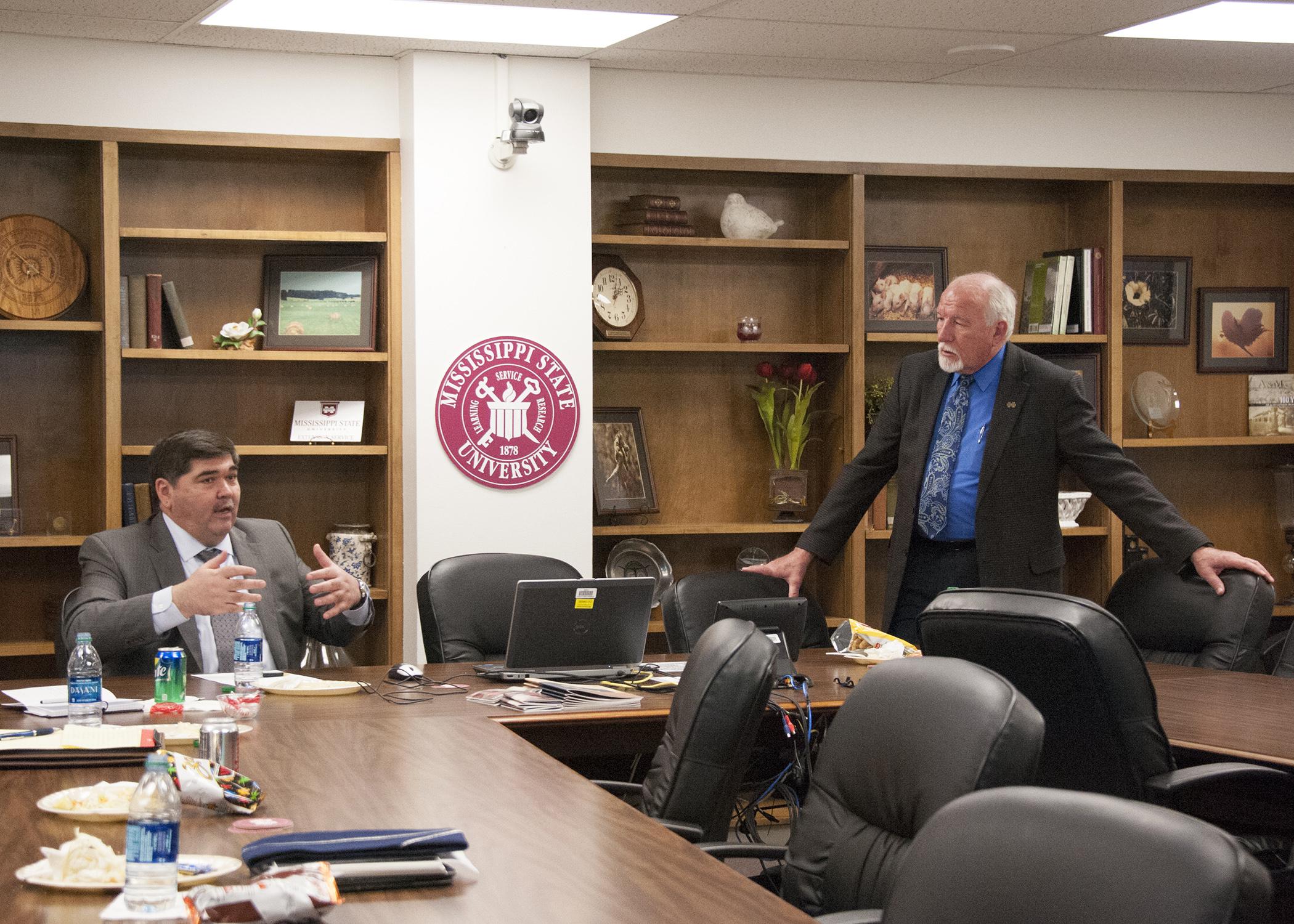 H.E. Bakhtiyar Gulyamov, left, speaks during a meeting with Bill Herndon, associate vice president of the Mississippi State University Division of Agriculture, Forestry and Veterinary Medicine April 15, 2015. Gulyamov is Ambassador Extraordinary and Plenipotentiary of the Republic of Uzbekistan to the United States. (Photo by MSU Extension Service/Kat Lawrence)