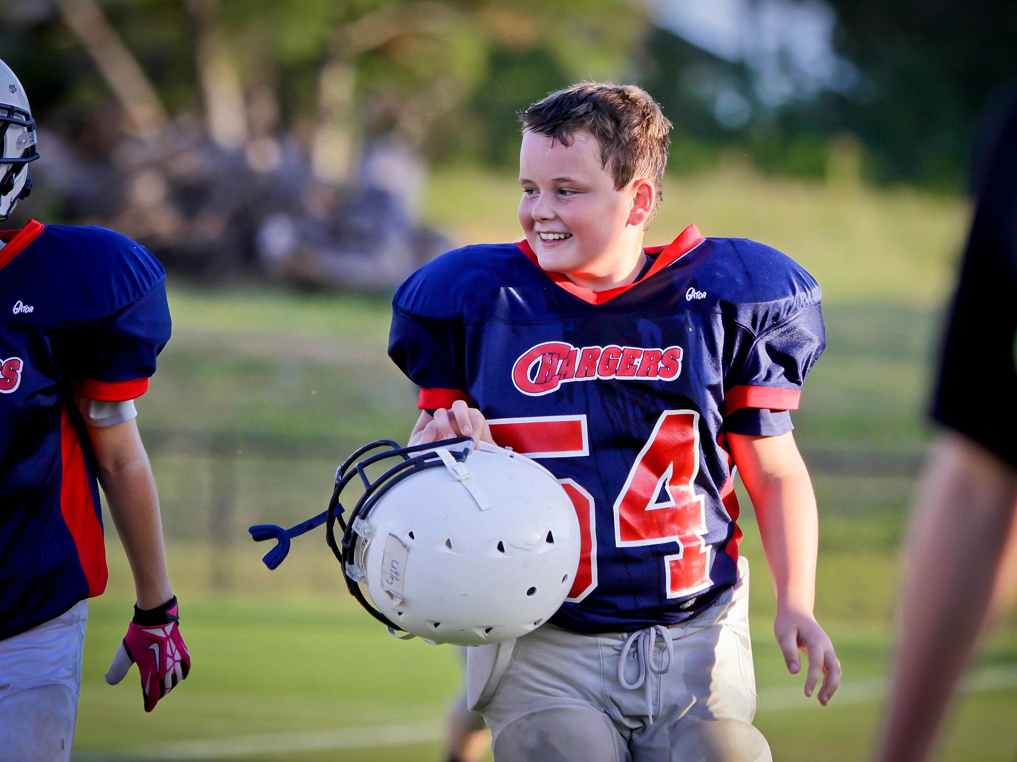 Young athletes need family support on and off the field, especially when it comes to staying hydrated and eating nutritious foods. (Photo by MSU Extension/Brian Utley)