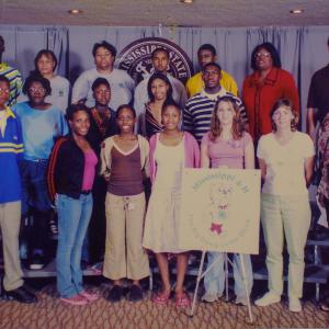 A group of teens standing on risers.