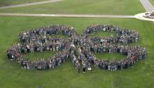 More than 600 4-H'ers gathered on the Mississippi State University campus to create a clover-leaf photograph to celebrate the 100th anniversary of 4-H in Mississippi. The perimeter of the shape was mapped out using GIS and GPS technologies.