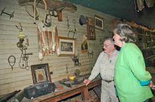 Tom Wilburn and Jeannine Smith spend hours exploring the history of farm life long ago near Artesia and Wilburn's experiences in the harness-racing industry. (Photo by Linda Breazeale)