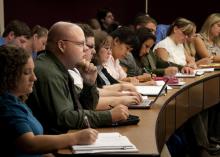 The long admissions process yields a veterinary class that becomes a family of sorts for the next four years. Rachel Smith, from left, and Christopher Karnes sit with their classmates of the Class of 2014 during a lecture. (Photo by Tom Thompson)