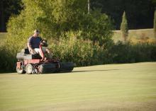 William Ruffin, a research associate with the Department of Plant and Soil Sciences at Mississippi State University, mows turf research plots at the R. R. Foil Plant Science Research Center Sept. 8, 2016. (Photo by MSU Extension Service/Kat Lawrence)