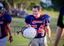 Young athletes need family support on and off the field, especially when it comes to staying hydrated and eating nutritious foods. (Photo by MSU Extension/Brian Utley)