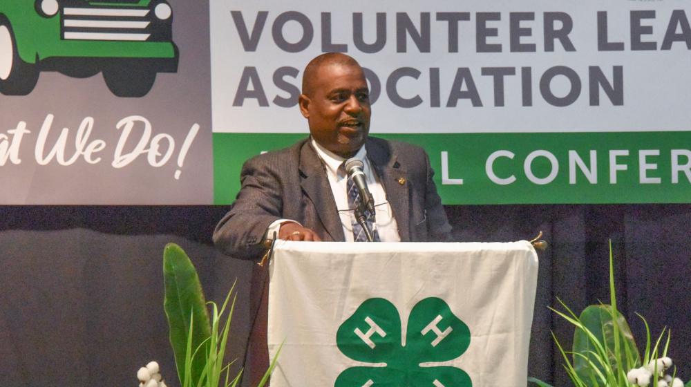 A man speaking at a podium.