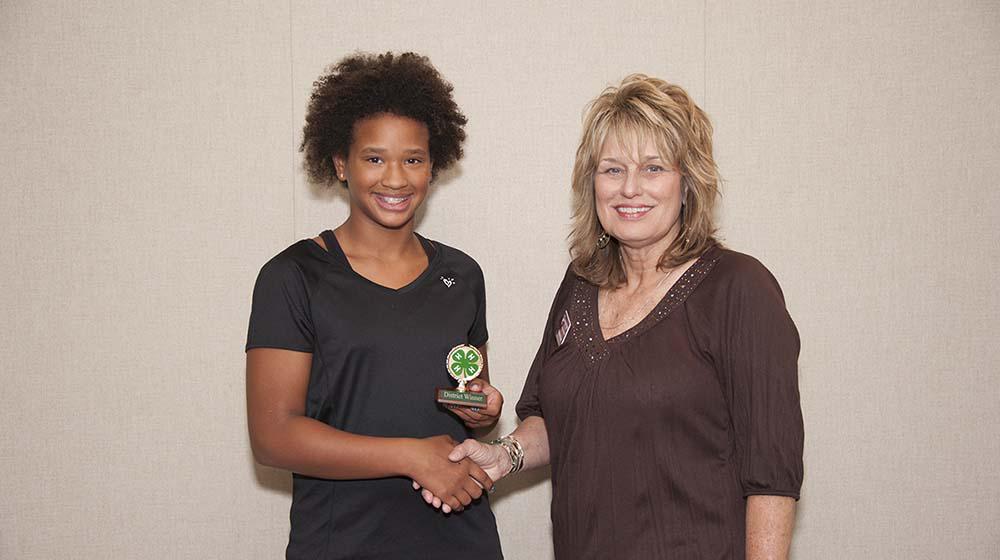 A 4-H'er wins an award.