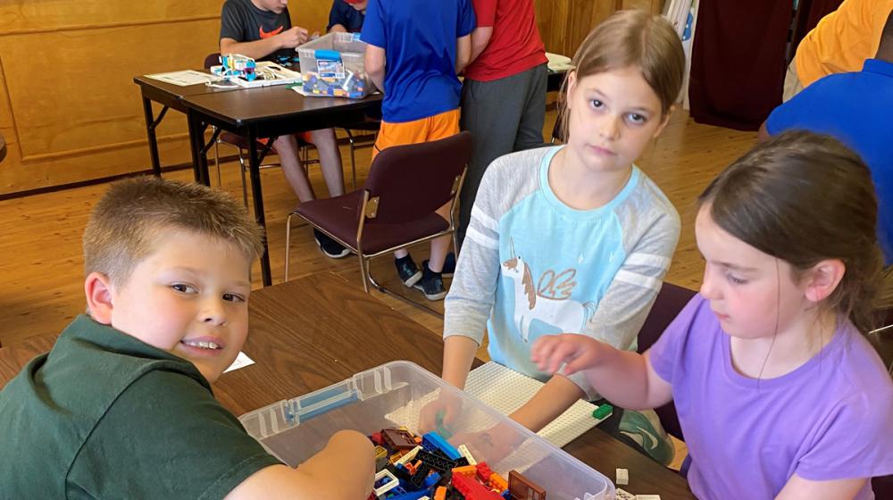 Kids playing with legos.