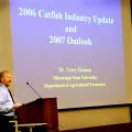 Mississippi State University agricultural economist Terry Hanson speaks at the National Warmwater Aquaculture Center's Fall 2006 catfish seminar held recently at MSU's Delta Research and Extension Center in Stoneville. Hanson told the crowd that rising corn demand will lead to even higher catfish feed prices for farmers in the coming year. (Photo by Robert H. Wells/Delta Research and Extension Center)