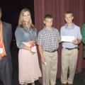 Joshua Holmes of Walthall County, from left, and Laci Lunn of Pontotoc County, represented the state's top two fund-raising counties at the 2007 4-H Congress. They presented a check to Alabama 4-H members Buddy Skipper and Ben Jones, both sixth graders from Enterprise. Leadership Team member Cord Davis of Bolivar County assisted in the presentation. (Photo by Marco Nicovich/MSU Ag Communications) Larger view.