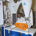 Mississippi State University bioenergy researcher Radhakrishnan Srinivasan conducts a run-through of sieving and aspiration equipment used to separate protein, fat and fiber particles in a corn-to-ethanol byproduct. (Photo by Jim Lytle)