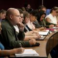 The long admissions process yields a veterinary class that becomes a family of sorts for the next four years. Rachel Smith, from left, and Christopher Karnes sit with their classmates of the Class of 2014 during a lecture. (Photo by Tom Thompson)