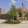 Trees planted at the east and west ends of a building, such as those at The Citizens Bank of Philadelphia branch in Starkville, provide shade and reduce energy use.