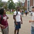 Michael Carlew (right), a senior studying landscape architecture and landscape contracting and management at Mississippi State University, talks to two other MSU students about the role landscape architects play in the environment. (Photo by MSU Ag Communications/Scott Corey)