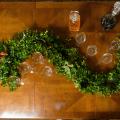 Green garland on a table.