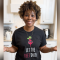 A woman stands in a kitchen