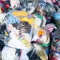 Bags are filled with used clothing.