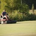 William Ruffin, a research associate with the Department of Plant and Soil Sciences at Mississippi State University, mows turf research plots at the R. R. Foil Plant Science Research Center Sept. 8, 2016. (Photo by MSU Extension Service/Kat Lawrence)