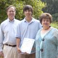 Andrew Shaman, center, a senior majoring in forestry at Mississippi State University, received a $3,500 scholarship from the National Garden Clubs. The award was presented by Ann Chiles, scholarship chairwoman for the Garden Clubs of Mississippi, and Ian Munn, dean of MSU’s College of Forest Resources. Shaman is the son of Chris and Felicia Shaman and a resident of Brandon. (Photo by MSU College of Forest Resources/Karen Brasher)