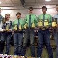 Tucker Wagner, far left, a graduate student in the Mississippi State University Department of Animal and Dairy Sciences, and Brett Crow, far right, an instructor in the department and coach of the MSU Livestock Judging Team, are pictured with the Lincoln County 4-H team at the statewide 4-H/FFA livestock judging contest. The event was held at the MSU Horse Park in Starkville, Mississippi, on May 21, 2016. Team members from left are Rylie Melancon, Walker Williams, Jacob Johnson and Will Watts. (Submitted Ph