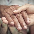 Communication with other family members can help caregivers balance the task with family obligations, work and self care. (Photo by iStock)